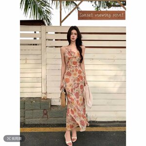 木子李的李橘夏微醺橘花斜裁吊带鱼尾夏季度假雪纺碎花连衣裙女