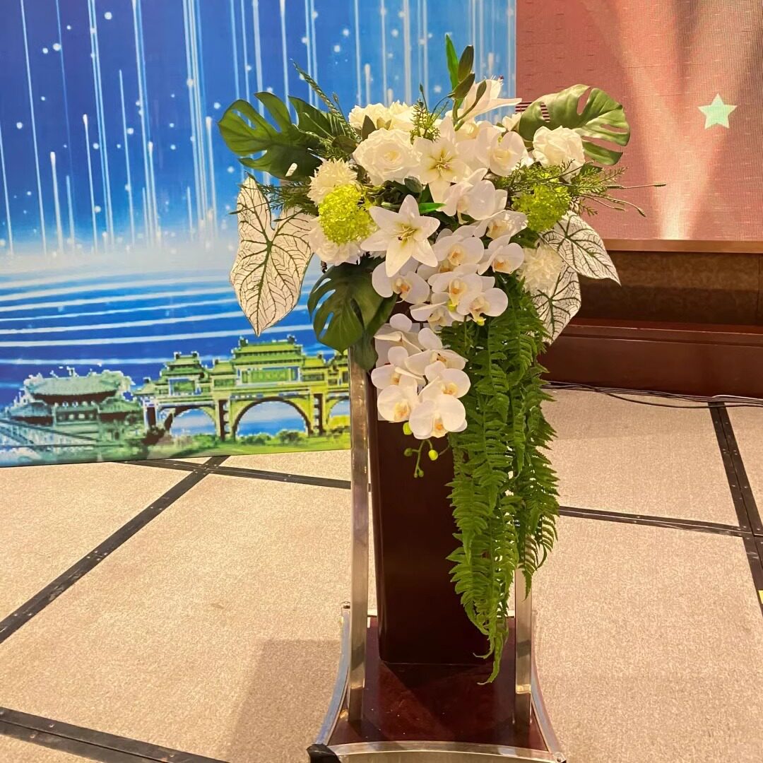 签到装饰台仿真花假花酒店宴会演讲主席台花艺高档会议讲台花桌花图片