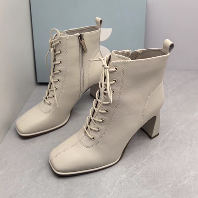 Comely康莉撤柜断码秋季真皮时装靴圆头粗高跟后拉链短靴女马丁靴