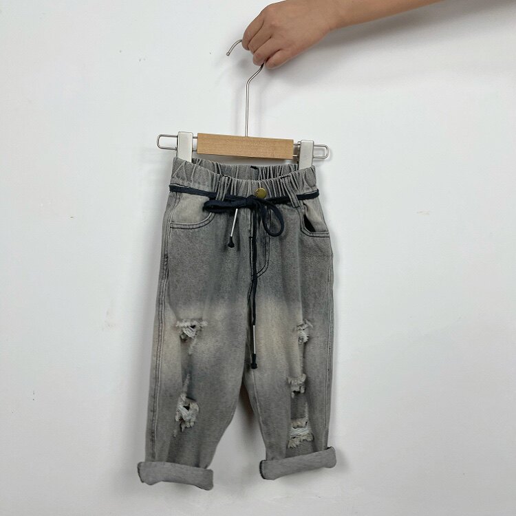 安系列品牌折扣秋装新款中小童破洞休闲牛仔裤男女童洋气儿童裤子
