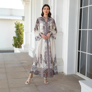 中东穆斯林女长袍V领印花流苏气质阿拉伯连衣裙迪拜拍照服装出片