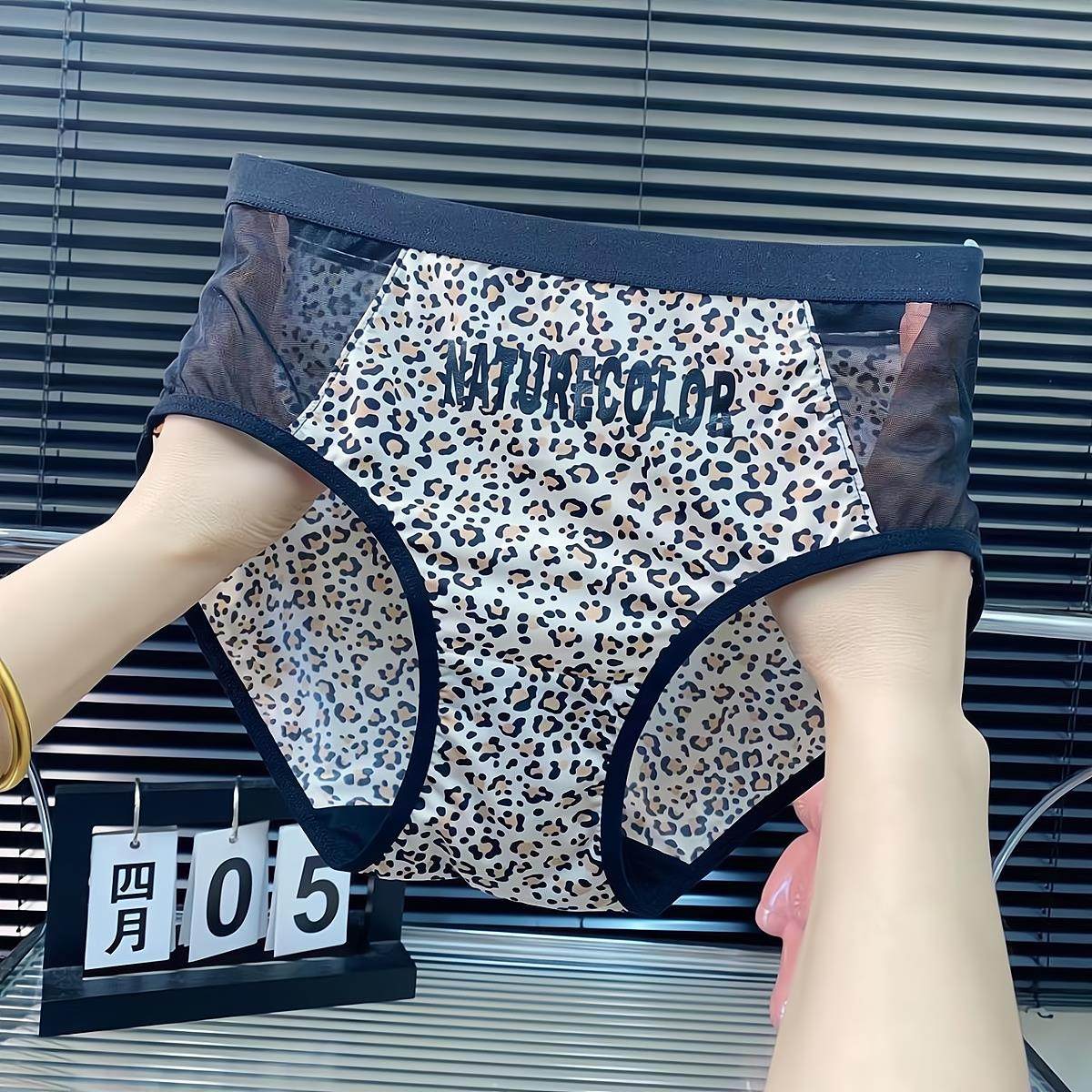 维多利亚性感豹纹镂空网纱女士mm大码无痕爆款弹力三角裤高档内裤