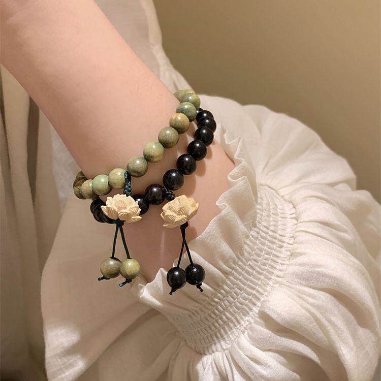 绿檀木串珠子莲花手链女款图片