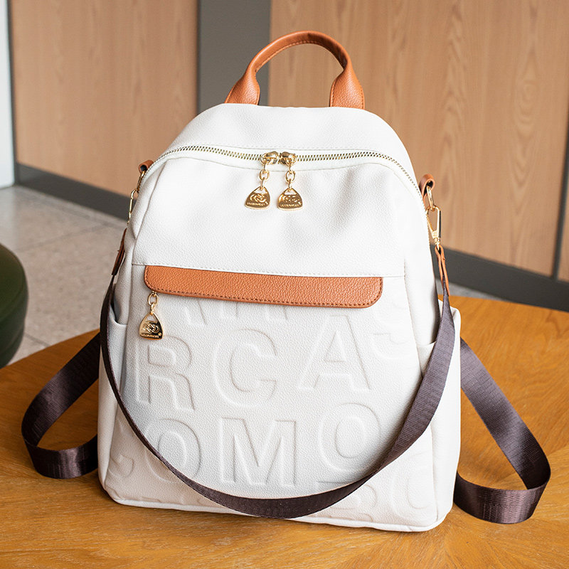 高级感双肩包女2025新款字母压花旅行背包休闲通勤百搭大学生书包