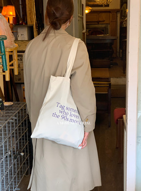 A moment official_英文字母帆布包小众设计大容量单肩学生帆布包