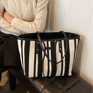 小C&K大容量格纹包包女2025新款简约通勤单肩包学生上课手提