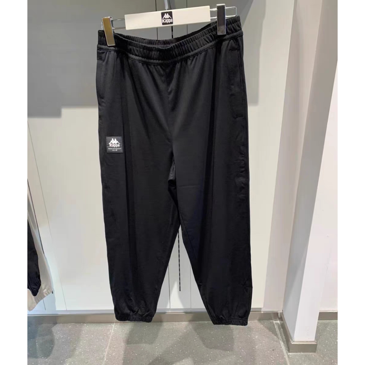 卡帕背靠背Kappa女子2025夏款运动休闲长裤9分裤K0E42CJ80
