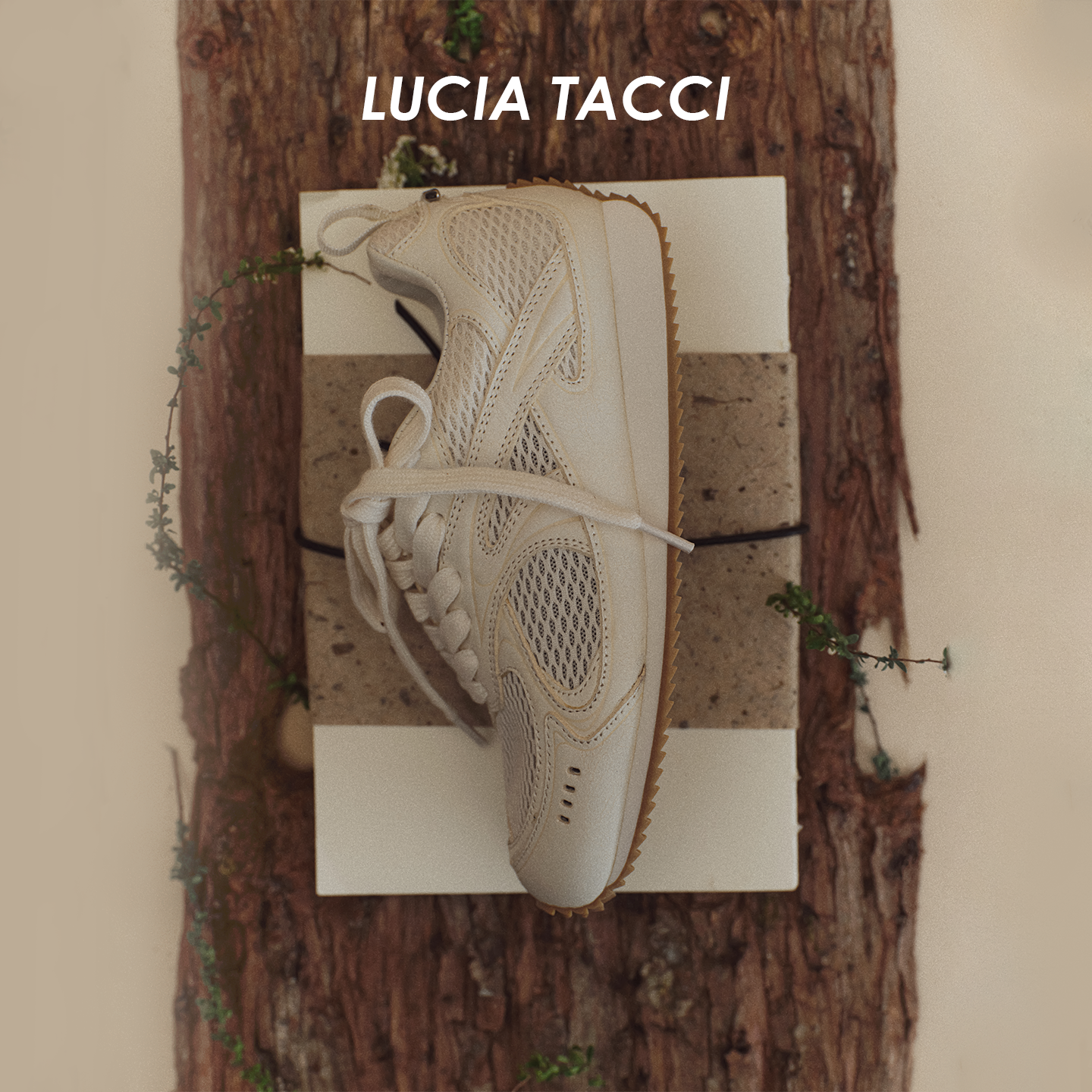 LUCIA TACCI 经典细爆裂纹肌理牛皮不对称扭转休闲轻运动阿甘鞋