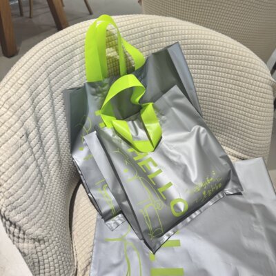 新款服装店袋子装衣服用塑料袋手提袋女装童装衣服包装购物礼品袋