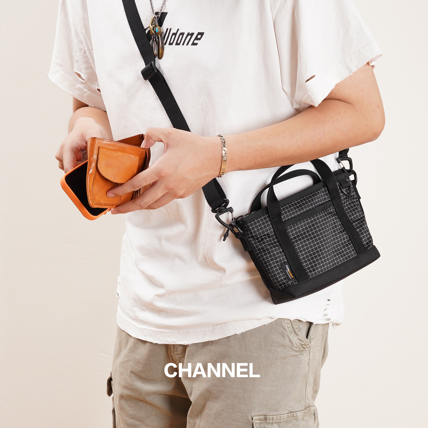 2026新款考杜拉弹道尼龙格纹设计感小型收纳随行斜挎包防水手机包