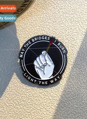 May My Burning Bridges ght the Way Brooch Holding a t Match