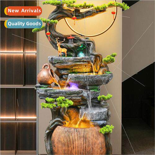 Large floor-to-ceiling circulation water fountain indoor hum