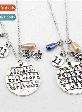 Movie and TV s Weird Tales Necklace Eleven Small 11 26 lette