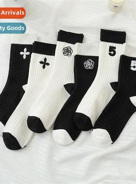 Trendy new black and whe color collisi camellia flower flowe