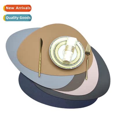 New egg-shaped irregular lychee grain PU lear placemats 38cm