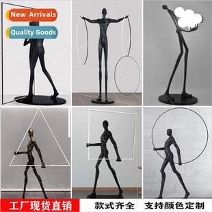 Modern humanoid art sculpture holding ball floor lamp hotel