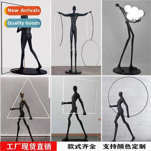 Modern humanoid art sculpture holding ball floor lamp hotel