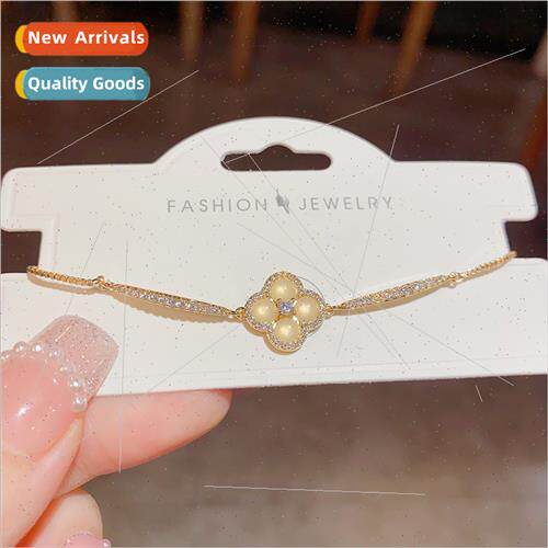 Fashion sweet cat eye stone four-leaf flower pull-out bracel