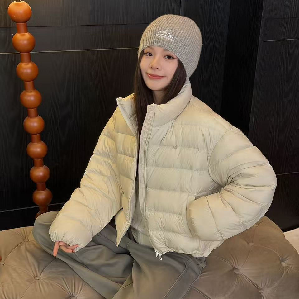 Nikoy冬季新款空气层0压感蓬松轻暖立领排骨羽绒