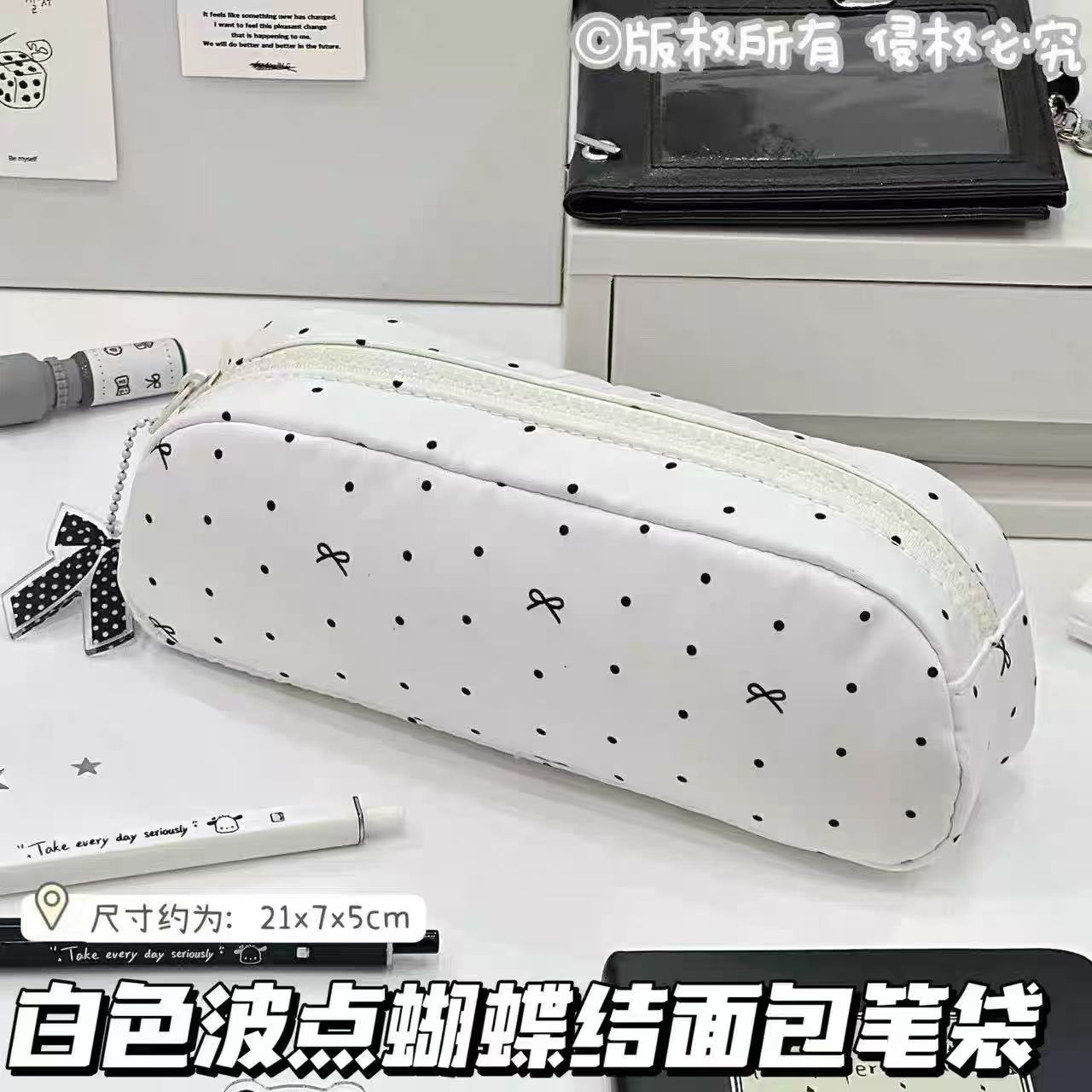 原创韩系ins波点蝴蝶结面包笔袋