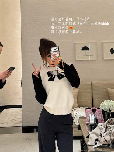 蝴蝶结水钻扣拼色套头长袖针织