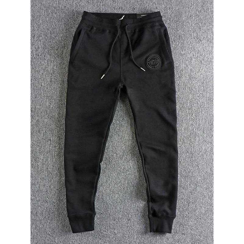 代购香港潮男春秋美式刺绣微章修身小脚休闲卫裤男潮流运动束脚裤