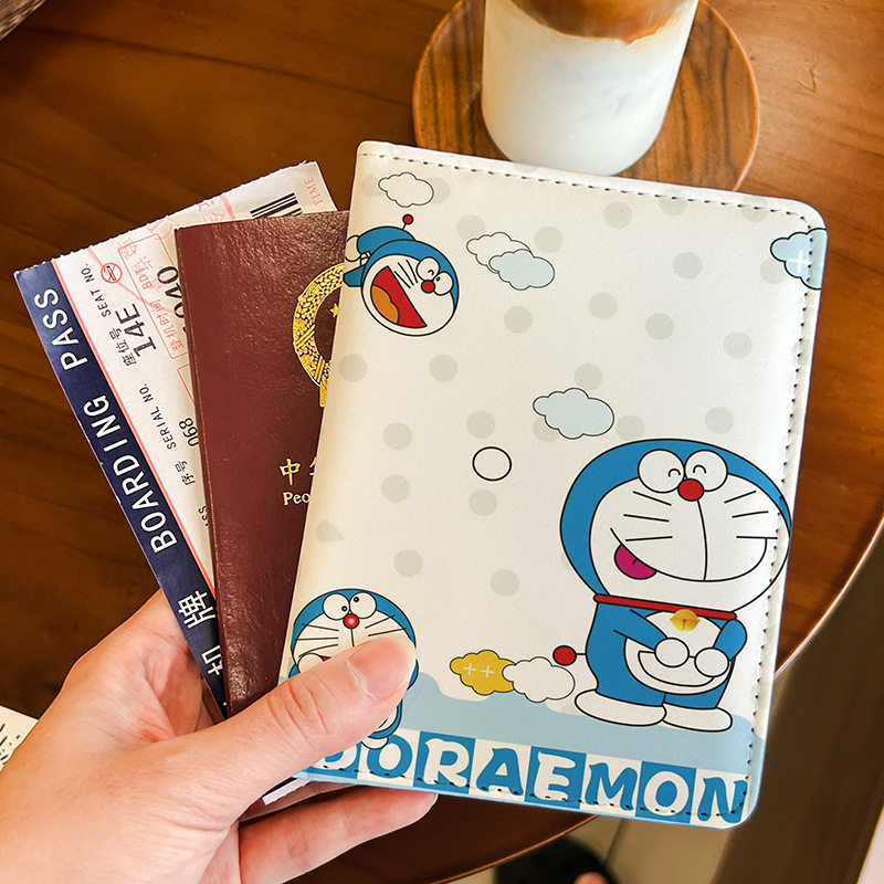 叮当猫多卡位旅行证件包