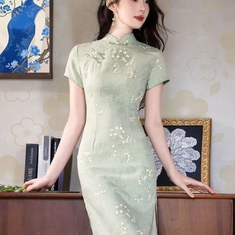 2026春夏新款复古花印花竹节麻泡泡满天星中古风短款旗袍厂家批发