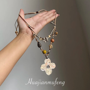 波密米亚双层花朵吊坠项链女2025新爆款高级感轻奢小众颈链毛衣链