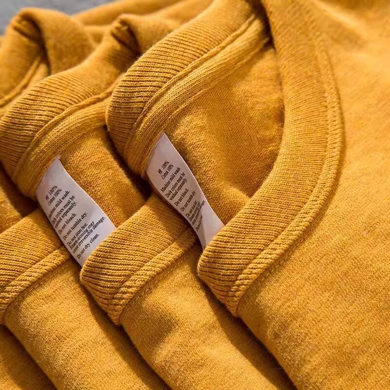 대외 무역 통관 아울렛 카운터는 봄과 가을에 유출된 미국 헤비급 새 순면 긴팔 티셔츠를 철수하고 픽업했습니다