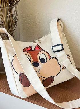 2025新款帆布单肩斜挎包大容量卡通休闲饺子包学生上课通勤托特包