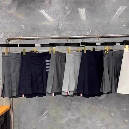 【赠退货宝】TUMA TB百褶裙四杠高腰半身裙显瘦短裙A字前短后长裙