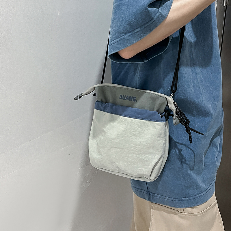 休闲百搭撞色斜挎包男户外运动手机包便携收纳袋刺绣百搭单肩包女