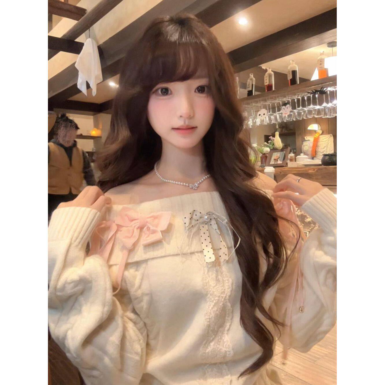 "奈奈心绪"甜美圣诞蝴蝶结一字肩毛衣女冬新款小众设计感纯欲上衣