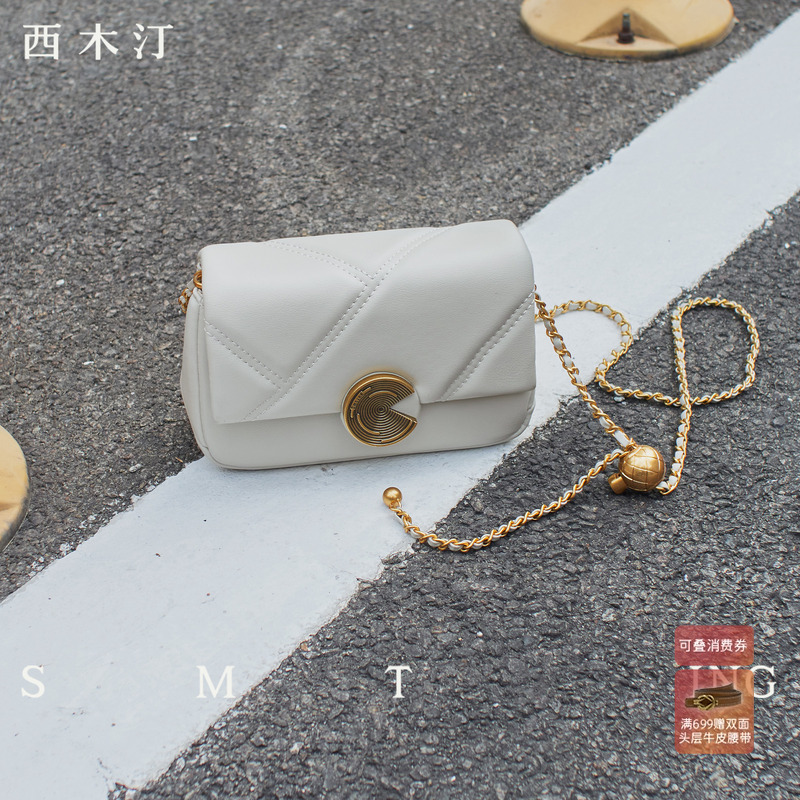 西木汀椰奶牛皮菱格链条包女