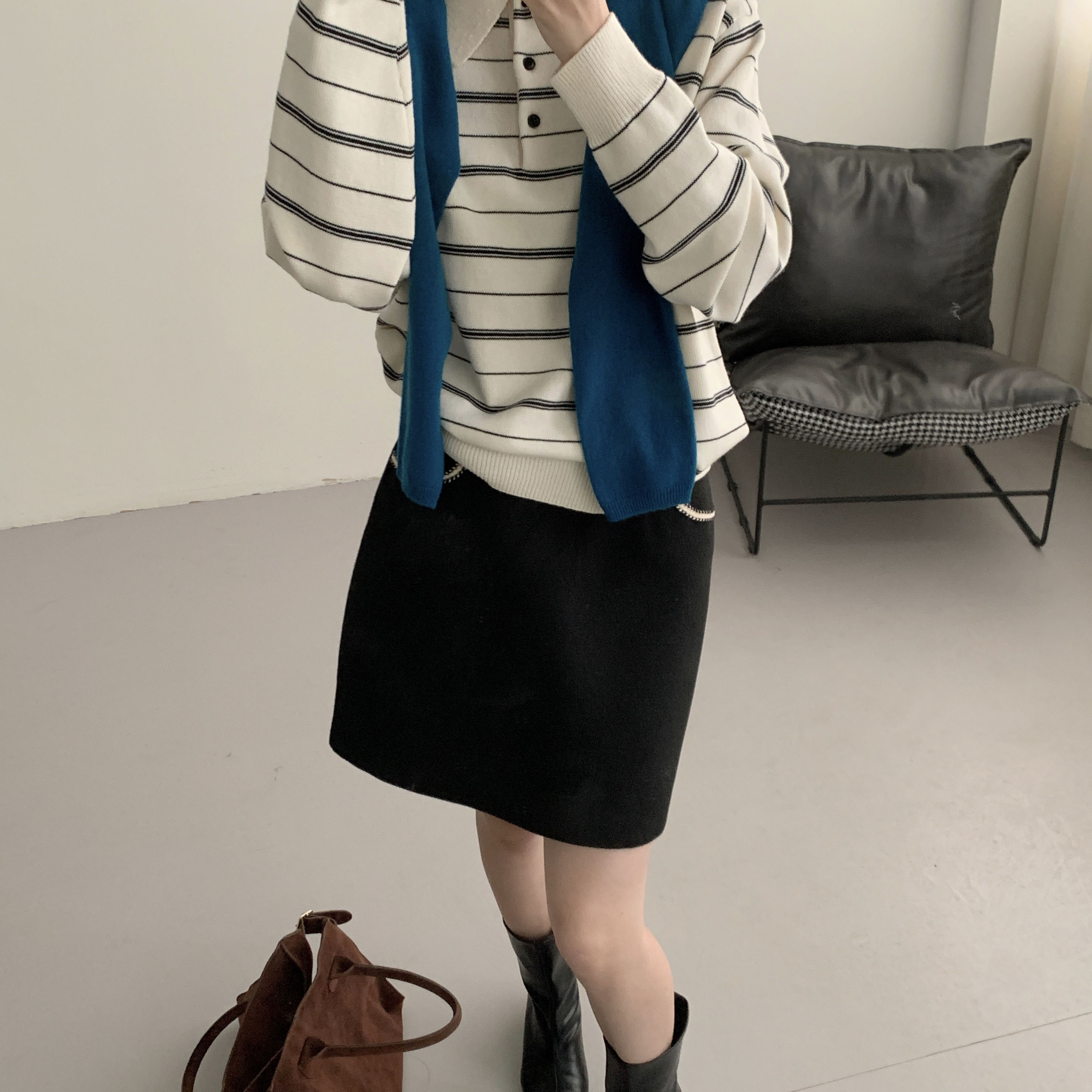 荷宝娜黑色半身裙女2025新款时尚高级感通勤百搭显瘦高腰a字裙冬