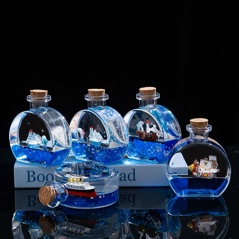 创意香水瓶沙漏油滴卡通漂浮油漏办公桌面解压玩具家居装饰摆件