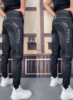 S113秋季舒适优质男士刺绣字母时装修身百搭个性中高腰束身牛仔裤