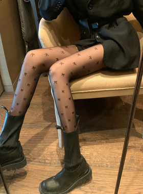 0d蝴蝶结丝袜女性感黑丝纯欲连裤袜可爱jk防勾丝波点黑色薄款