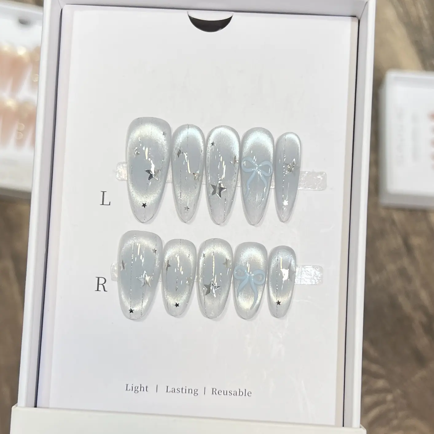 黛瑞森 冰透蓝淬玻璃珠猫眼腮红美甲流星光蝴蝶结纯手工穿戴甲片