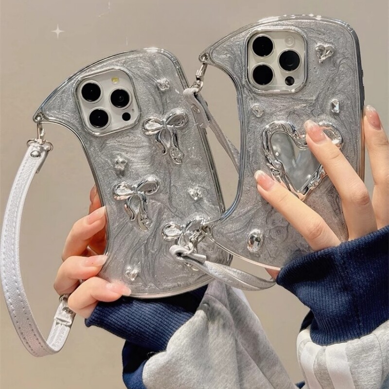 ins冷淡轻奢高级感爱心蝴蝶结手提包适用苹果17手机壳挂绳iphone13promax大孔14女15硅胶12防摔全包16保护套8