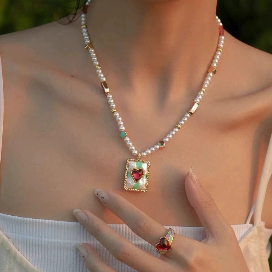 英国topwhit千金易梦玲紫眼爱心项链女小众夏日多巴胺撞色珍珠