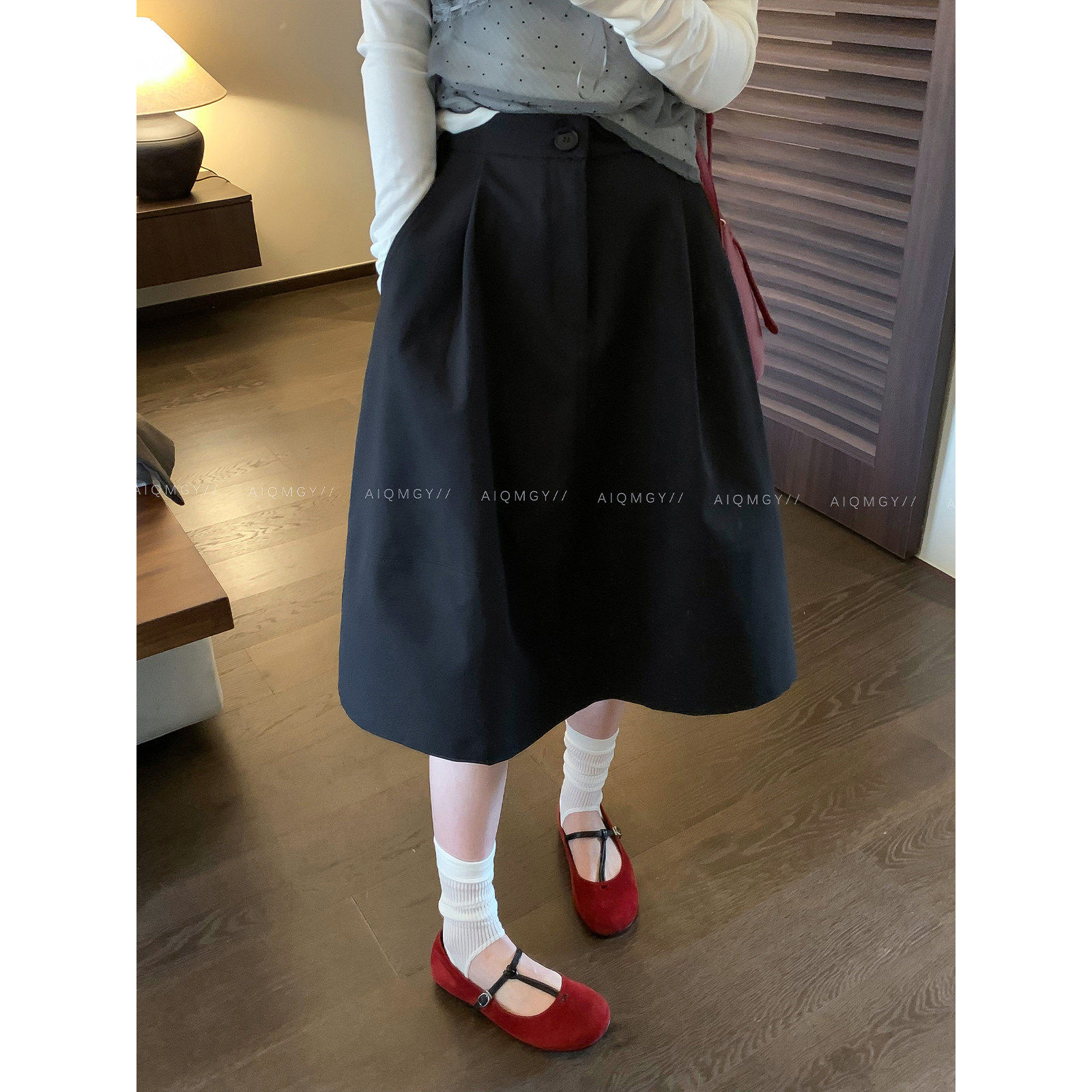 爱情魔鬼鱼 黑色通勤伞裙半身裙女2026春季新款高腰百搭A字中长裙
