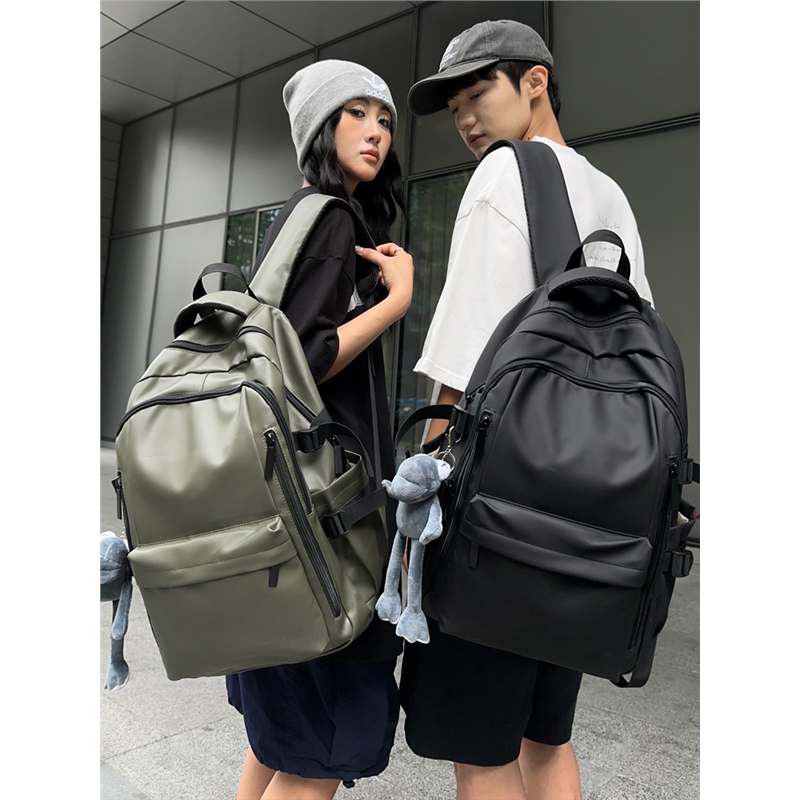 质感防水双肩包潮男初中生书包女大学生大容量骑行机车风旅行背包
