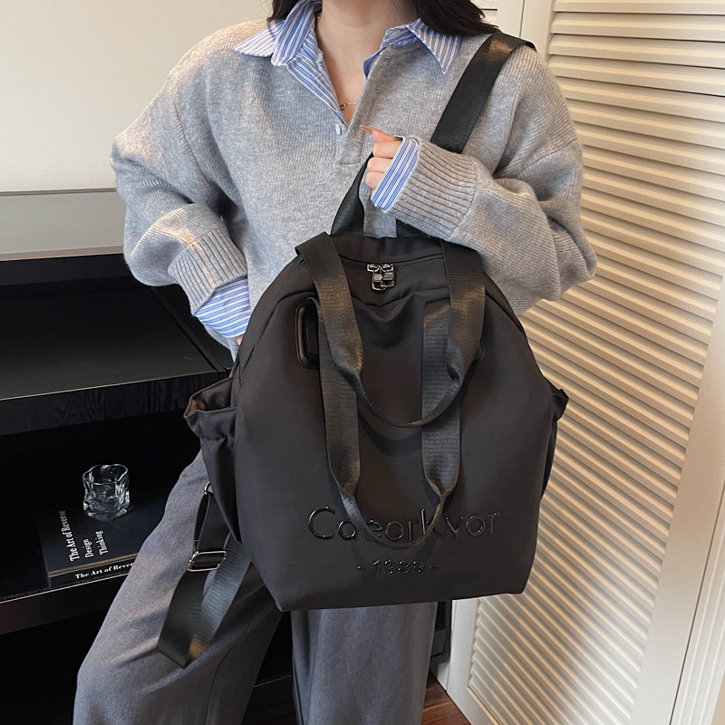 休闲潮流双肩包时尚大容量手提包