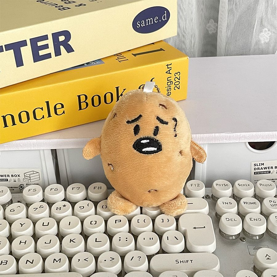 卡通呆萌南方小土豆毛绒可爱表情玩偶包包公仔挂件ins同学礼物