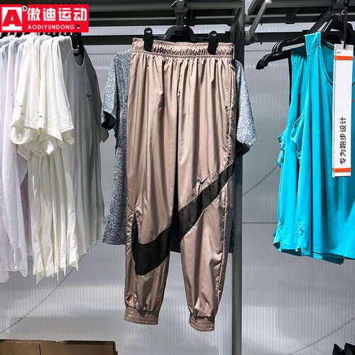 Nike耐克女裤2025夏款大Logo舒适透气梭织休闲束脚长裤HM8977-214