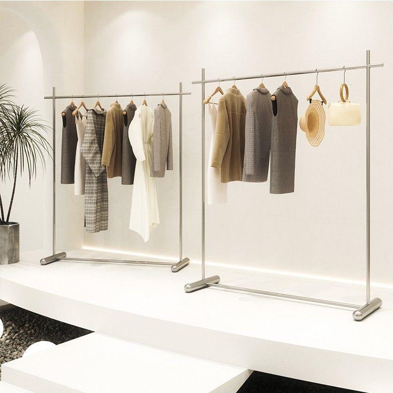 2025新服装店陈架式不钢挂中岛网女店展示架列落地锈衣架侧挂红装