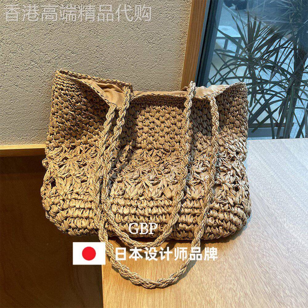 日本ファッションバッグ大容量沙滩草编包手提编织女包海边镂空包