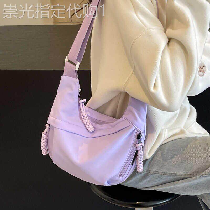 轻奢时尚防水女士骑行包包女2025新款休闲百搭托特包男运动斜揹包